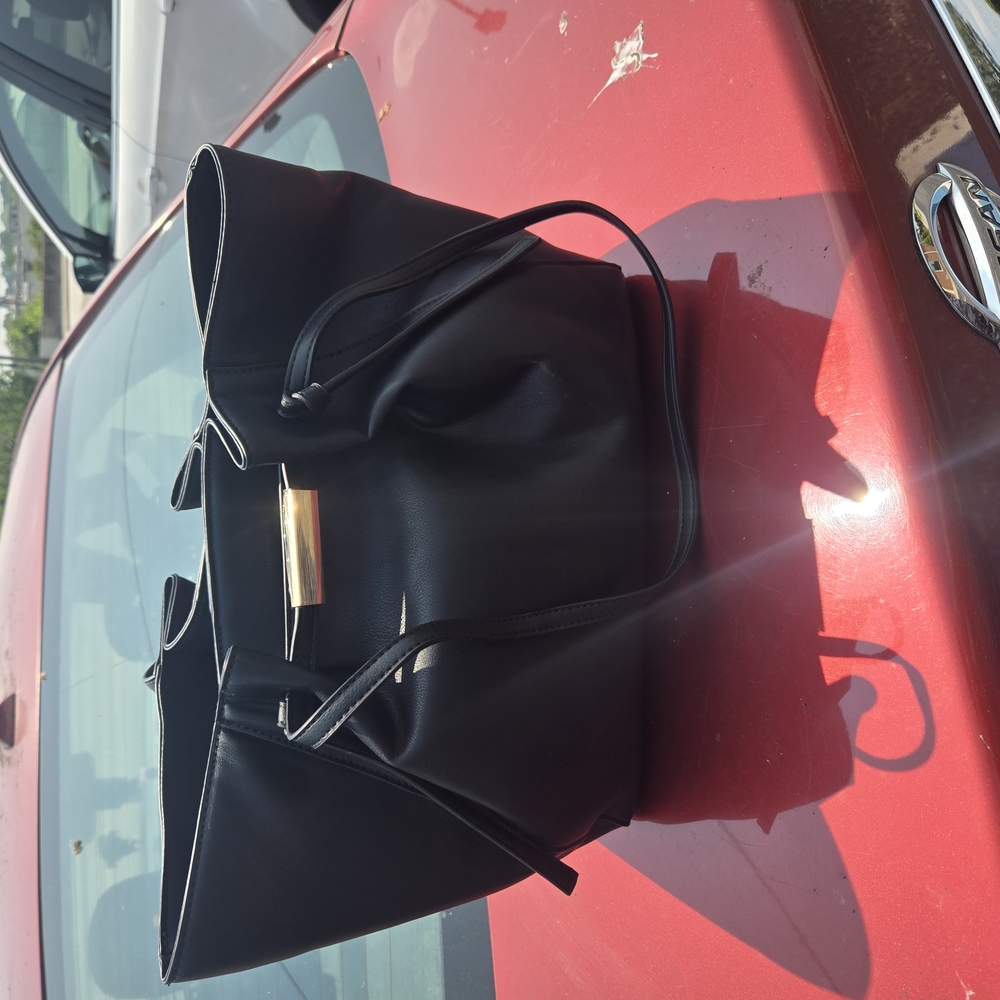 Iceberg Black Tote with Sleek Design and Gold Accents